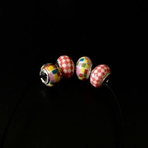 🦋 FOUR 925 SILVER TRIM CERAMIC HANDPAINTED BEADS.